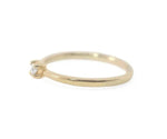 Twisted band zircon ring in sterling silver with modern wave design
