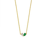 Load image into Gallery viewer, Toi Et Moi pendant necklace with sparkling zircon and deep green emerald in pear cuts, symbolizing unity and love on a gold-plated chain.


