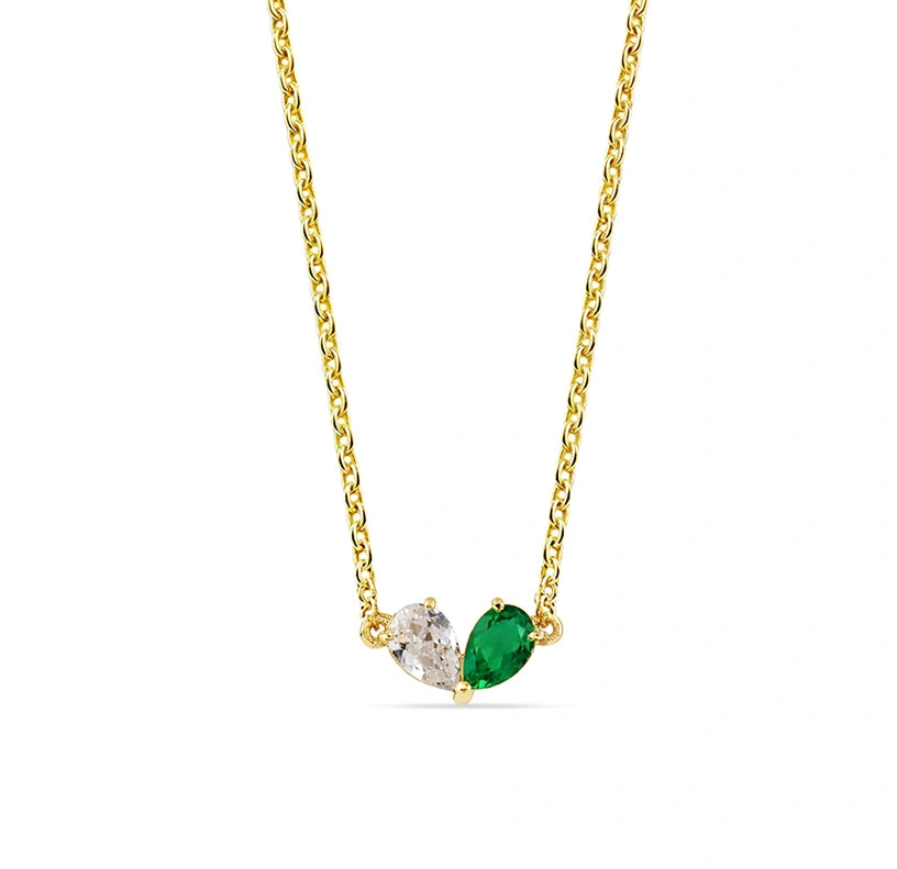 Elegant heart-inspired duo gemstone necklace featuring pear-cut emerald and zircon, a modern emblem of connection and individuality