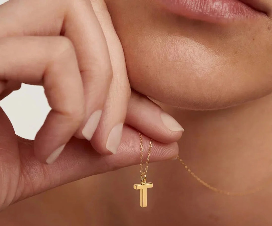 Elegant T initial necklace with delicate gold-plated charm perfect for layering or gifting