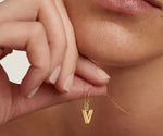 Elegant V initial necklace gold featuring a fine chain perfect for everyday wear
