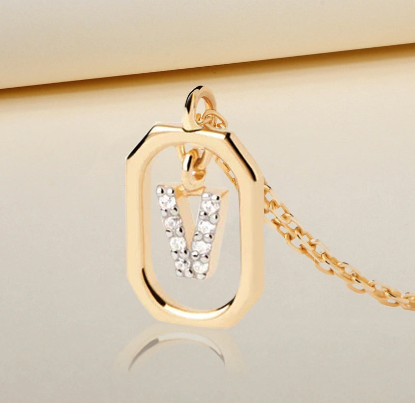 Personalized dainty necklace featuring a shimmering V initial charm encrusted with white zircon on a fine gold-plated chain