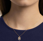 Load image into Gallery viewer, Elegant gold-plated initial necklace with a dangling zircon-studded letter V pendant on a delicate adjustable anchor chain
