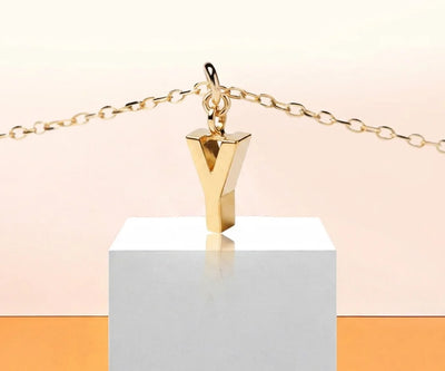 Dainty letter Y necklace in gold with minimalist initial pendant on a delicate chain