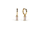 Small huggie hoop earrings featuring baguette-cut Rose Quartz stone with gold finish
