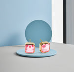 Modern square design studs with 10mm Tourmaline Bliss and secure push-back closure.
