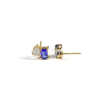 Sapphire and zircon gemstone stud earrings featuring deep blue sapphire paired with sparkling zircon stones in an elegant, timeless design.
