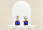 Gold-plated dangle earrings with blue sapphire and cubic zirconia accents

