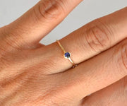Elegant sterling silver ring featuring a deep blue lab-created sapphire for everyday fine jewelry style
