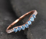 Beautiful blue topaz wedding ring perfect for brides who love unique gemstone jewelry
