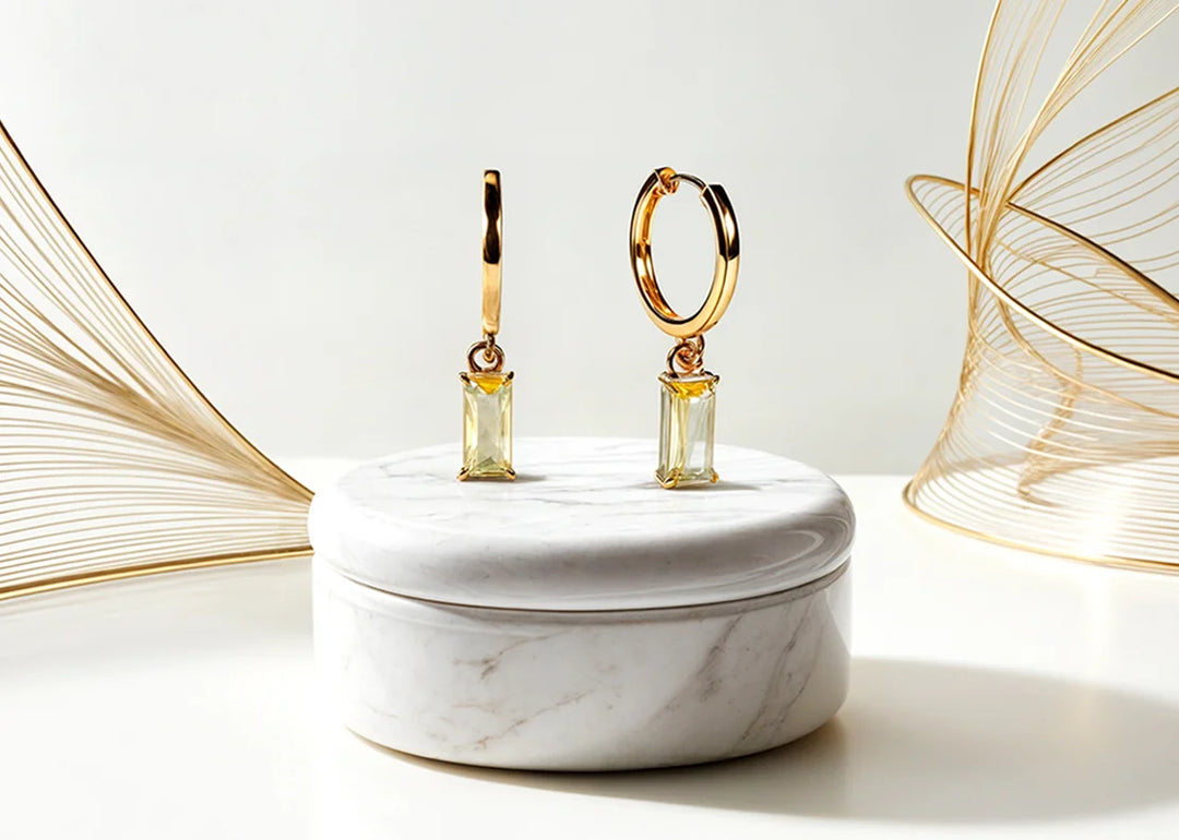 Stylish pair of citrine gemstone earrings in a modern gold setting

