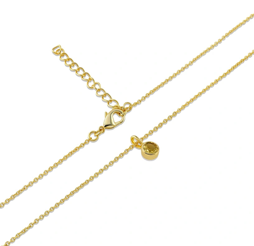 A cheerful November birthstone necklace designed to brighten any look with its vibrant citrine stone.
