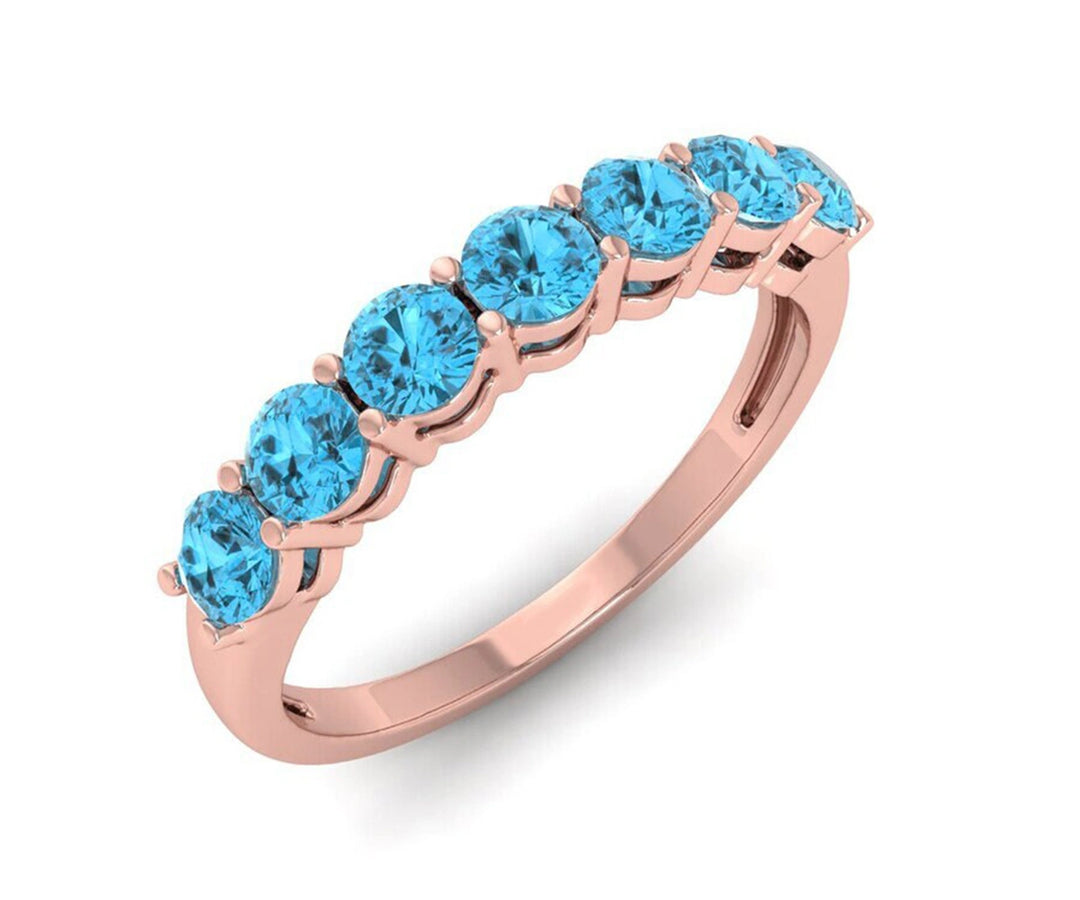 Chic and colorful Swiss blue topaz ring with calming blue hues in a sleek 925 silver and gold-plated design

