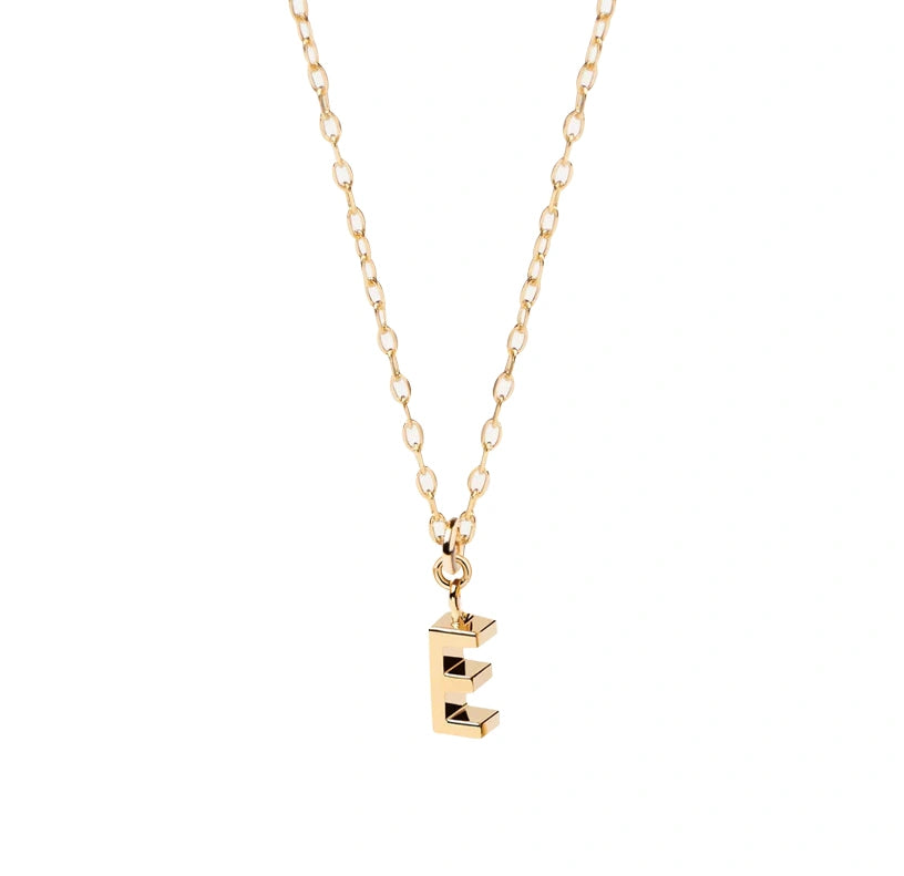 Close-up of Petite Glow Initial Necklace with the letter E, finished in 18K gold plating and suspended on an adjustable anchor chain.