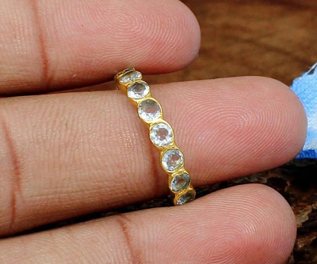 Aquamarine birthstone ring for March featuring a faceted blue gemstone in a delicate setting