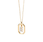 An initial gold pendant featuring a polished letter charm on a delicate gold chain, offering a personalized and elegant jewelry piece.
