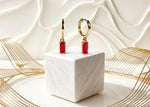Elegant Red Mirage Gold Huggie Earrings for Women
