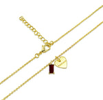 A garnet heart necklace gold design featuring a deep red heart-shaped gemstone set in a polished gold setting for a romantic and elegant look.
