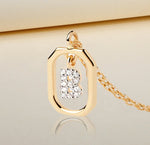 A B initial necklace gold featuring a polished letter “B” pendant on a delicate gold chain, offering a personalized and elegant jewelry piece.
