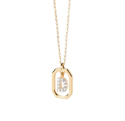 A gold initial D necklace featuring a polished letter “D” pendant on a delicate gold chain, adding a personalized and elegant touch to any outfit.