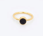 Oval druzy gemstone ring with shimmering surface in a stylish minimalist design
