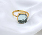 Dainty aquamarine stackable ring for women featuring a soft blue gemstone accent
