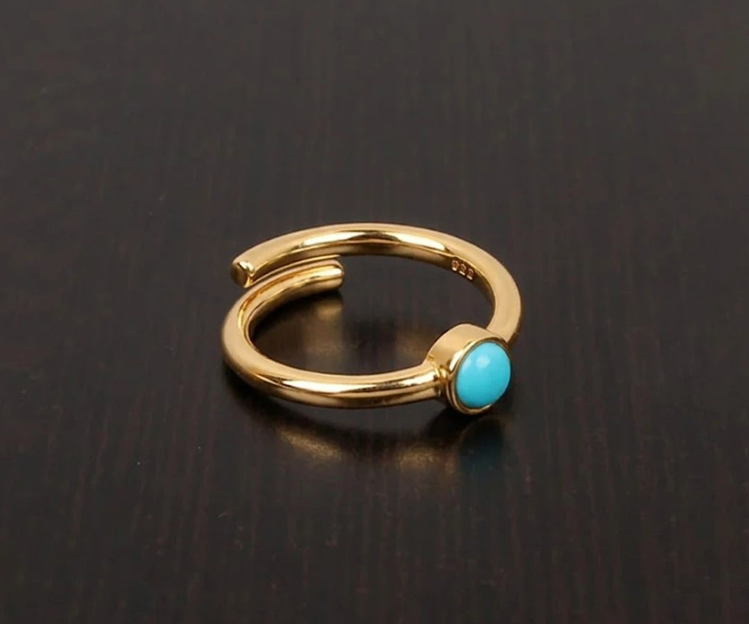 Minimal turquoise ring featuring a natural blue stone perfect for everyday wear