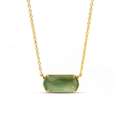 Delicate Green Amethyst drop pendant on an adjustable gold chain, showcasing bespoke craftsmanship and subtle sophistication—this green amethyst pendant adds a soft, elegant touch to both everyday and occasion wear.
