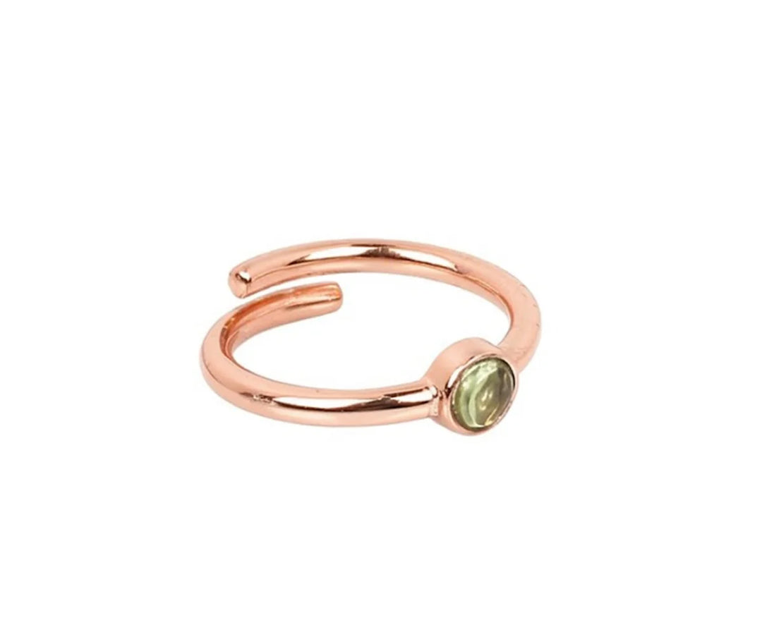 Oval cut green amethyst ring featuring a soft mint gemstone in a classic and timeless design