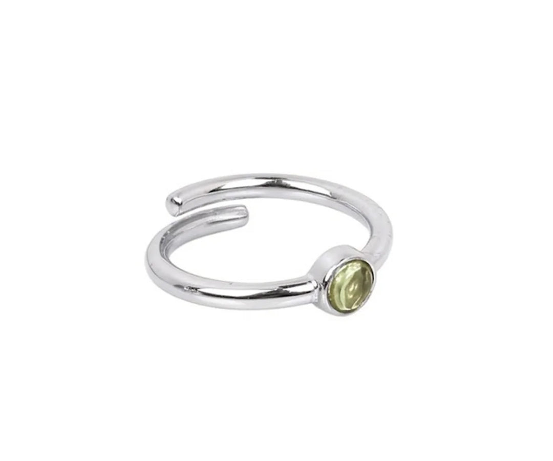 Green amethyst gemstone ring with a polished band offering a fresh and sophisticated look for women