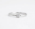 Cushion cut zircon ring in silver with elegant and timeless appeal
