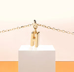 Petite and polished letter "H" pendant on a sleek chain, letter h necklace gold crafted for effortless everyday elegance.
