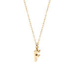 Golden dainty necklace with engraved letter "F", a modern keepsake with timeless elegance.
