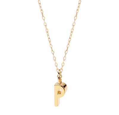 Gold dainty initial "P" necklace glowing with minimal elegance and personal charm.
