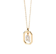 An initial gold pendant necklace featuring a polished letter charm on a delicate gold chain, offering a personalized and elegant everyday jewelry style.