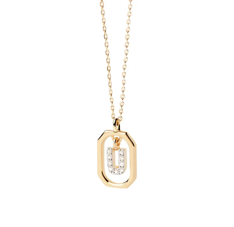 An initial necklace pendant featuring a sleek letter charm on a delicate chain, offering a simple and personalized everyday jewelry piece.