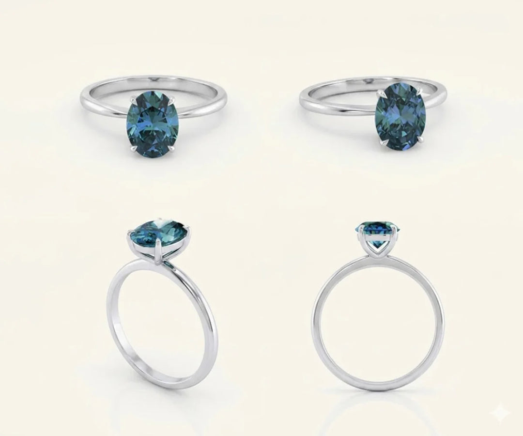 Vintage style teal sapphire engagement ring featuring deep blue green gemstone and halo diamonds