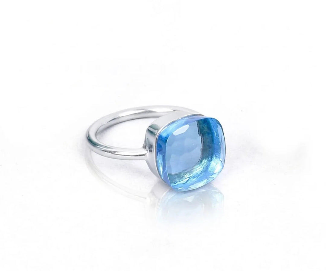 Classic blue topaz ring with brilliant cut stone perfect for everyday wear