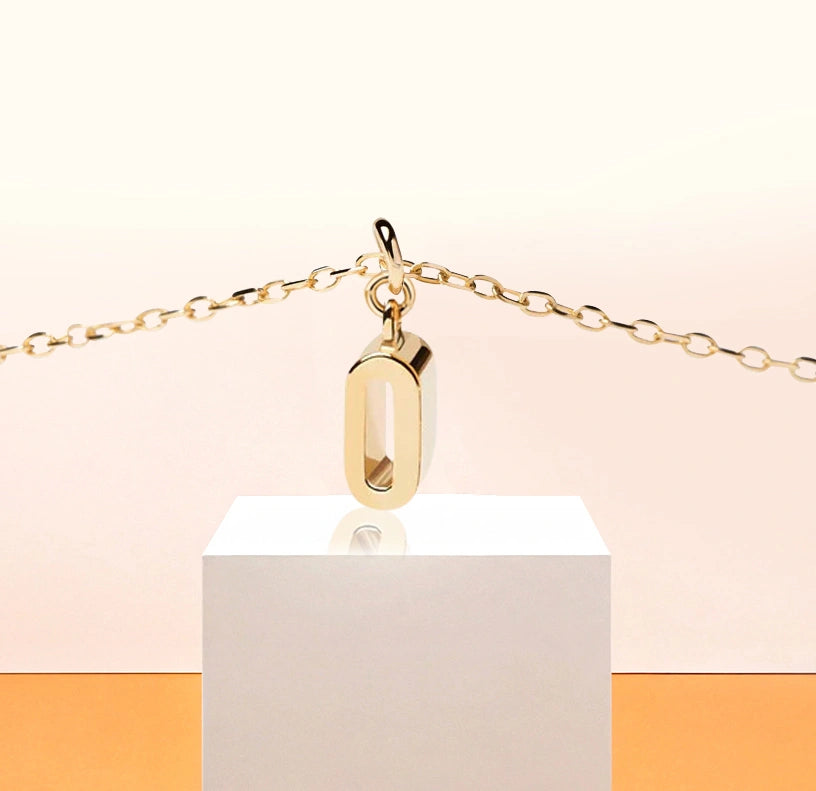 Refined and feminine initial "O" necklace, ideal for layering or a subtle solo statement.