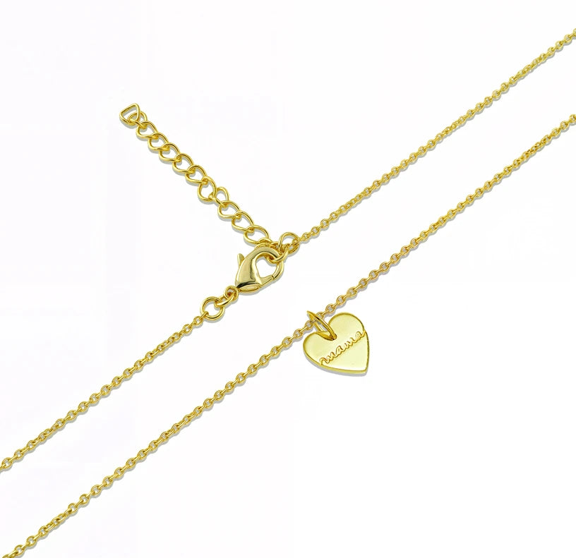 Delicate gold heart charm necklace inscribed with 'Mama' in script font — a timeless Mother's Day gift. 