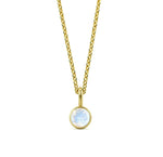 This moonstone birthstone necklace features a soft, iridescent glow set in a delicate pendant necklace for women.


