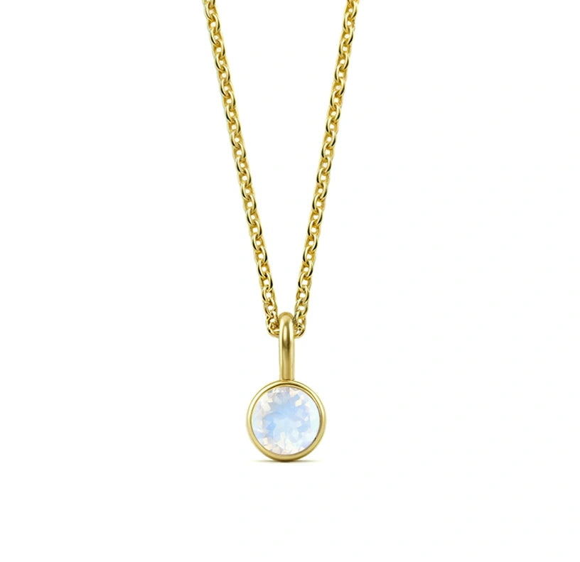 This moonstone birthstone necklace features a soft, iridescent glow set in a delicate pendant necklace for women.

