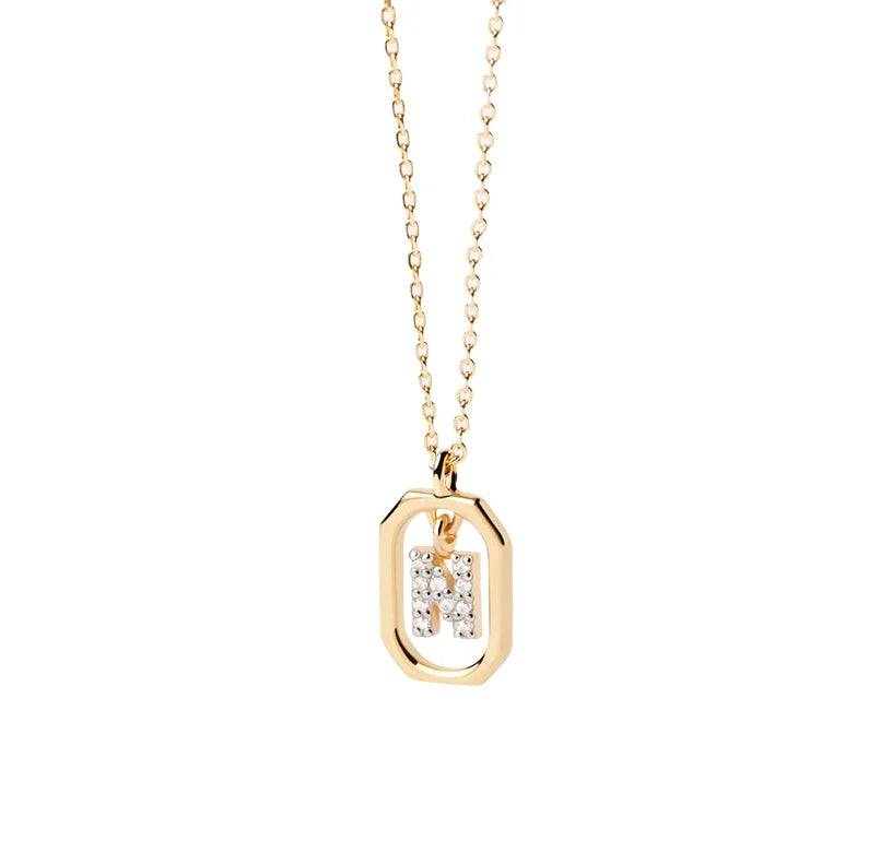 An N pendant featuring a polished letter “N” charm on a delicate chain, creating a simple and personalized jewelry piece.