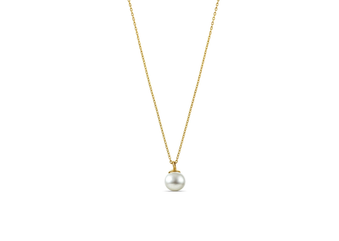 A pearl droplet necklace featuring a single teardrop-shaped pearl suspended from a delicate chain, adding a classic and elegant touch to any outfit.