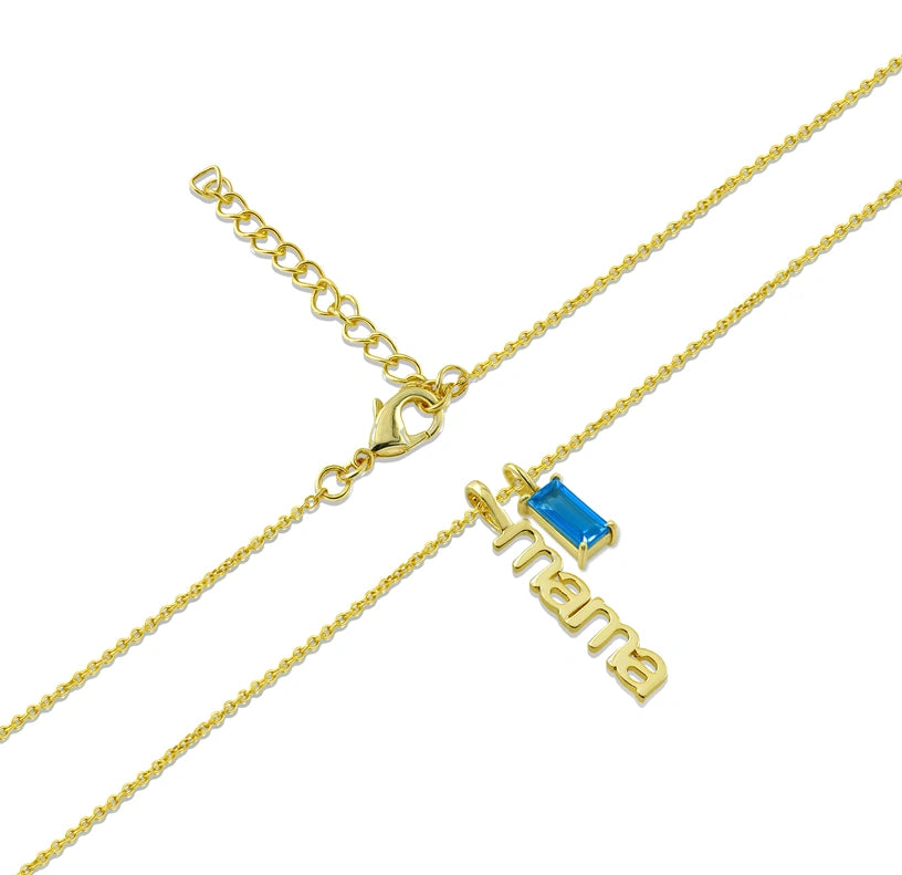 A vintage blue topaz necklace featuring a deep blue gemstone set in an antique-inspired pendant, adding timeless elegance to any outfit.