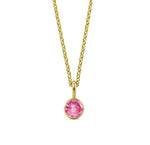 This pink tourmaline birthstone necklace features a soft blush gemstone set in a dainty pendant necklace for women.

