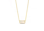 Close-up of Aurora Opal gemstone with gold setting birthstone opal necklace