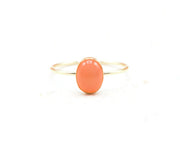 Handcrafted moonstone ring in gold-filled or silver, featuring a glowing 8x6mm gemstone with earthy red-orange tones.


