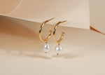 Gold-plated pearl hoop earrings with freshwater pearls
