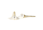Real pearl earrings stud featuring genuine pearls with a natural luster set in a classic stud design for timeless elegance.
